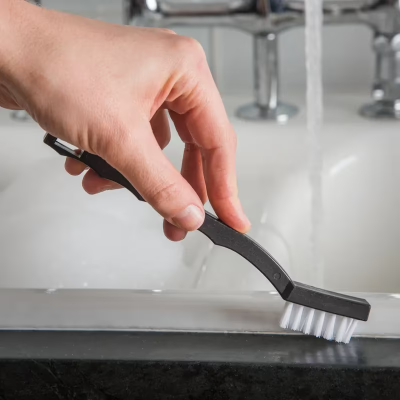 Carlisle Foodservice Products® Flo-Pac® Utility Toothbrush 7 IN PP Nylon Black With White Bristles 1/Each